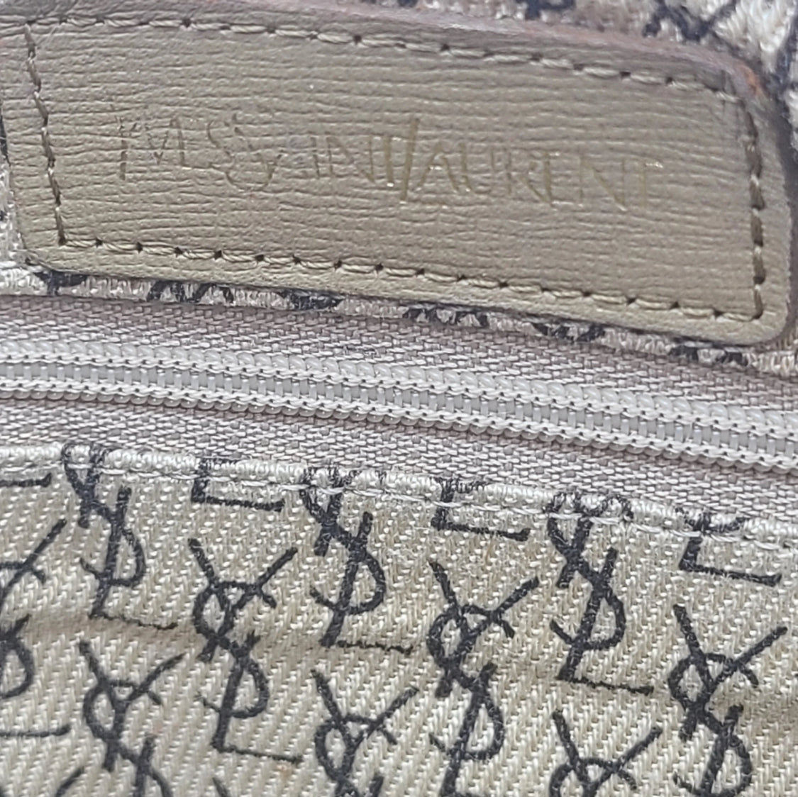 Yves Saint Laurent
Coated Canvas Leather Trimmed Clutch Preowned