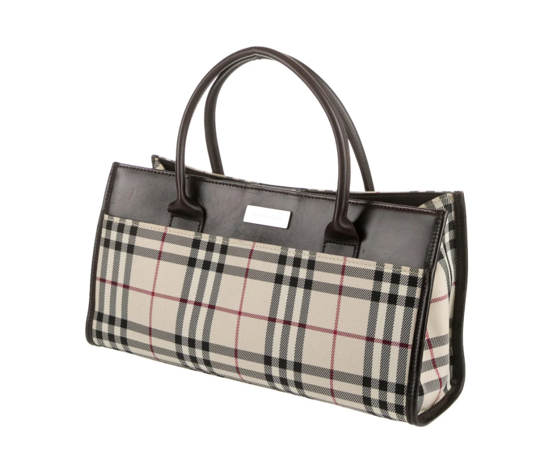 Burberry
Leather-Trimmed Horizontal Tote